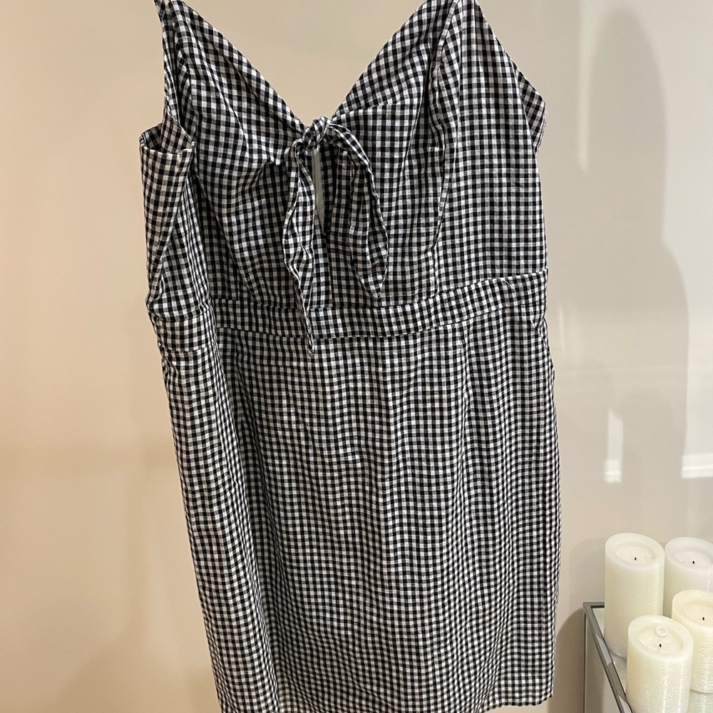 Lulu’s black and white gingham mini dress with front tie detail